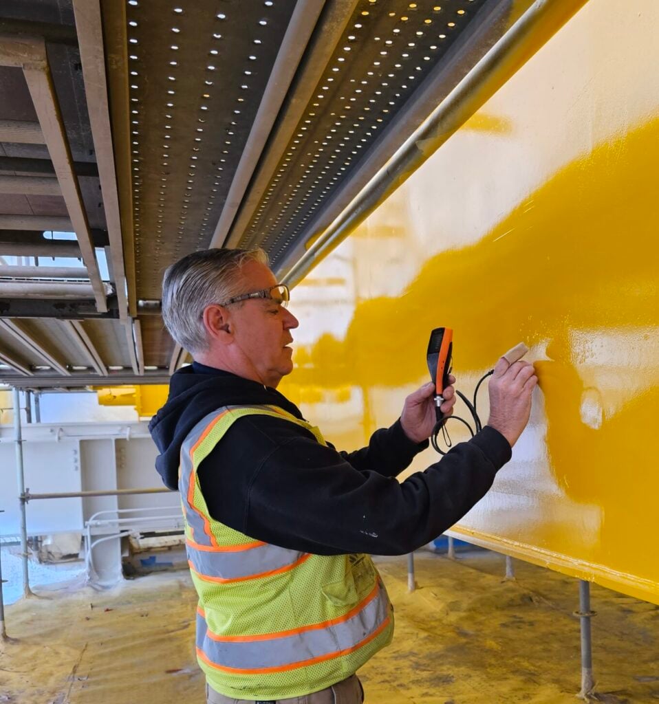 worker is performing the inspection or quality test to make the customer happy!